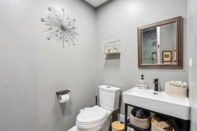 2025 Westbury Ln, Aurora, IL 60502 - half bathroom featuring toilet and a chandelier