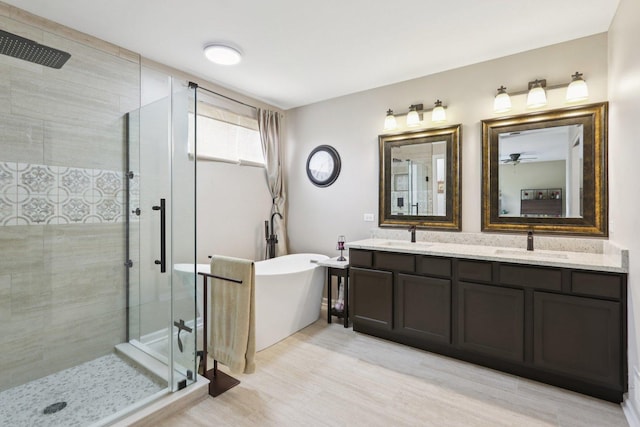 2025 Westbury Ln, Aurora, IL 60502 - full bath with a stall shower, double vanity, and a soaking tub
