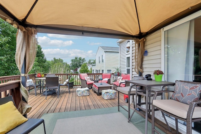 2025 Westbury Ln, Aurora, IL 60502 - wooden terrace with outdoor dining area and an outdoor hangout area
