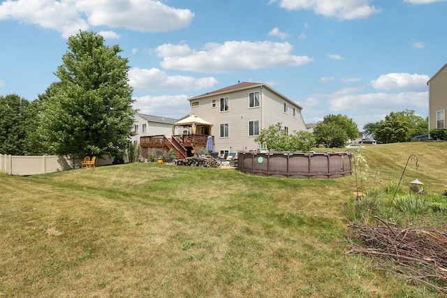 2025 Westbury Ln, Aurora, IL 60502 - view of yard with a deck, a covered pool, and stairs