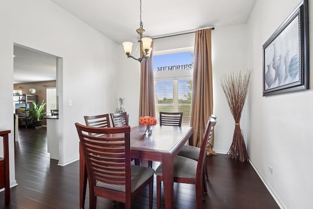 2025 Westbury Ln, Aurora, IL 60502 - dining room featuring a chandelier and dark wood-style flooring