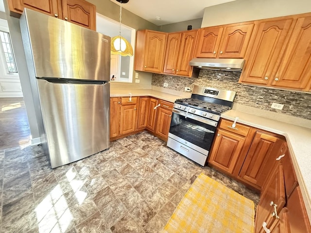 21317 W Shady Ln, Lake Zurich, IL 60047 - kitchen featuring appliances with stainless steel finishes, under cabinet range hood, backsplash, and light countertops