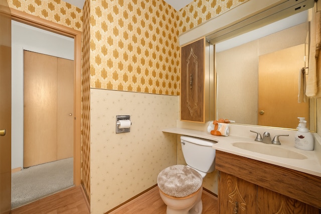 5530 Parkview Ct, Crestwood, IL 60418 - bathroom featuring wallpapered walls, wood finished floors, and vanity