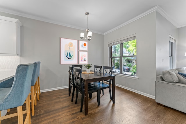 6351 N Glenwood Ave Unit 1S, Chicago, IL 60660 - dining space featuring dark wood-type flooring, ornamental molding, and a chandelier