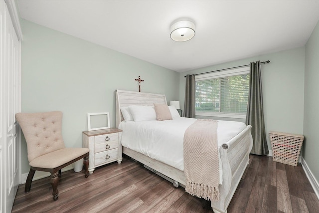 4113 W 97th Pl Unit 104, Oak Lawn, IL 60453 - bedroom featuring dark wood finished floors