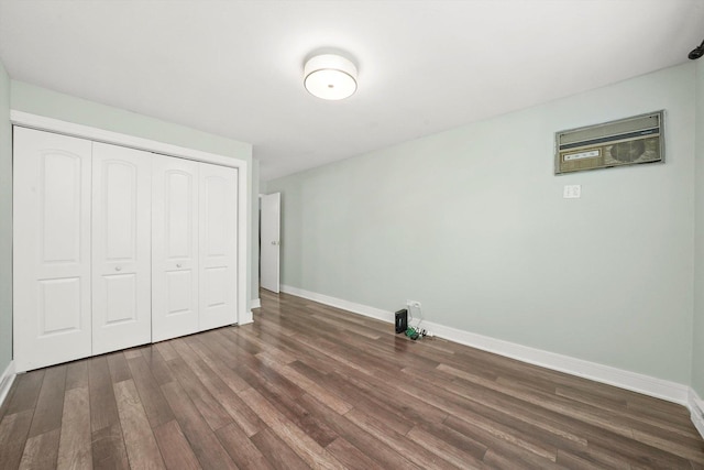 4113 W 97th Pl Unit 104, Oak Lawn, IL 60453 - unfurnished bedroom with wood finished floors and a closet