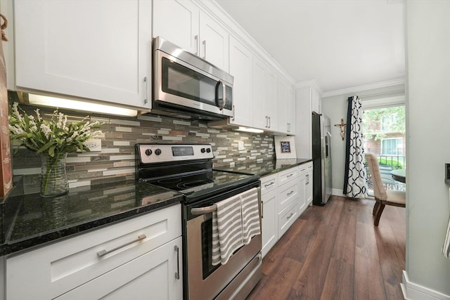 4113 W 97th Pl Unit 104, Oak Lawn, IL 60453 - kitchen featuring appliances with stainless steel finishes, tasteful backsplash, white cabinets, ornamental molding, and dark wood-style flooring