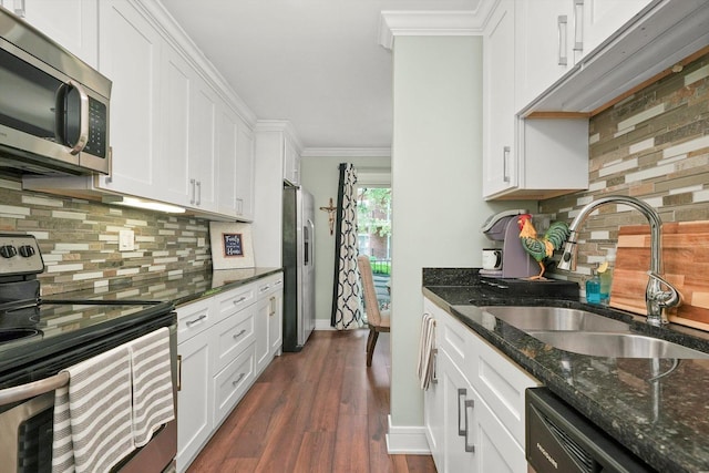 4113 W 97th Pl Unit 104, Oak Lawn, IL 60453 - kitchen with appliances with stainless steel finishes, crown molding, tasteful backsplash, white cabinets, and dark wood-style flooring
