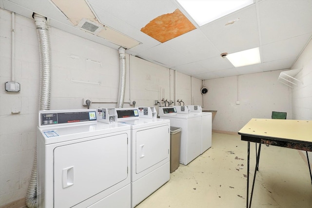 4113 W 97th Pl Unit 104, Oak Lawn, IL 60453 - community laundry room with separate washer and dryer and concrete block wall