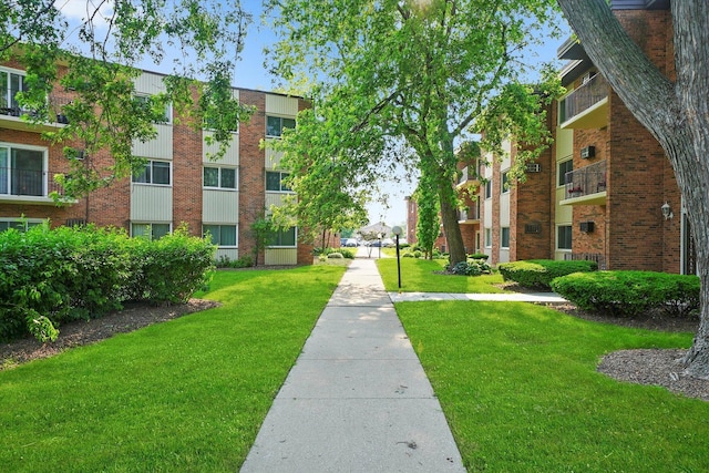 4113 W 97th Pl Unit 104, Oak Lawn, IL 60453 - view of property's community featuring a lawn