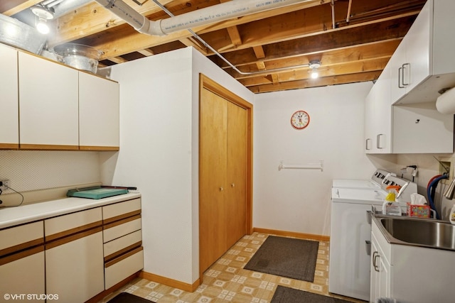 1709 Pebble Beach Ct, Hoffman Estates, IL 60169 - laundry room featuring cabinet space, washer and clothes dryer, and light floors