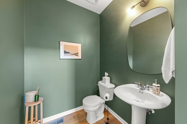 29W711 Cambridge St, Warrenville, IL 60555 - half bath featuring toilet and wood finished floors