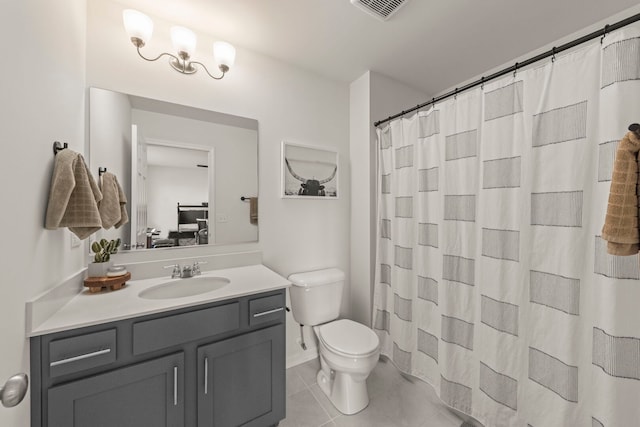 29W711 Cambridge St, Warrenville, IL 60555 - bathroom with vanity and tile patterned floors