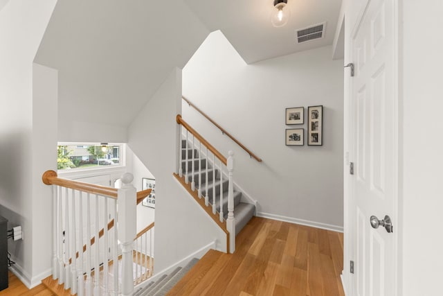 29W711 Cambridge St, Warrenville, IL 60555 - stairs featuring wood finished floors and baseboards