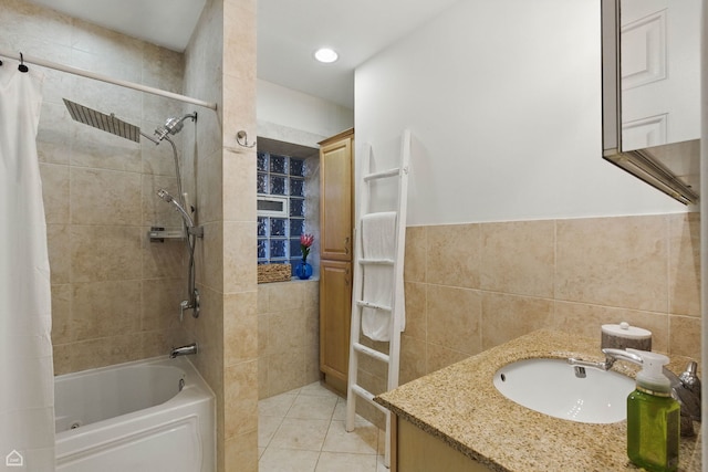 4857 N Drake Ave Unit G, Chicago, IL 60625 - bathroom featuring tile walls, shower / bathtub combination with curtain, tile patterned flooring, vanity, and recessed lighting