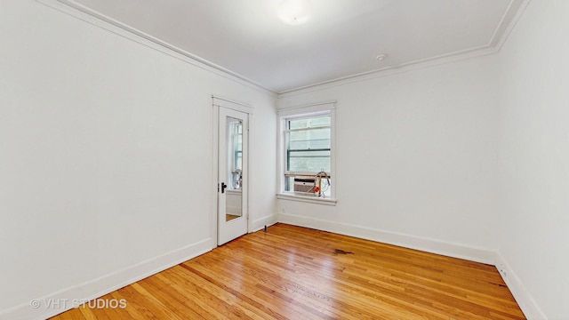 1646 E 54th St Unit 2, Chicago, IL 60615 - empty room with ornamental molding, light wood-type flooring, and cooling unit