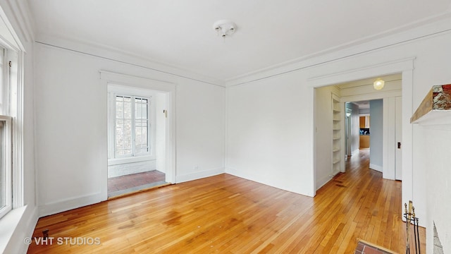 1646 E 54th St Unit 2, Chicago, IL 60615 - spare room with light wood-type flooring