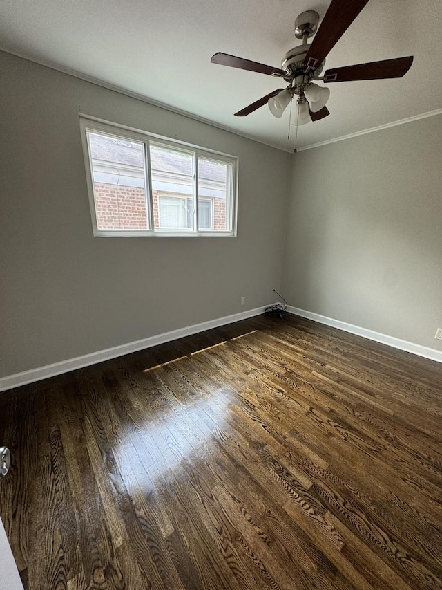 8117 S Keating Ave, Chicago, IL 60652 - unfurnished room with dark wood finished floors, ceiling fan, baseboards, and ornamental molding