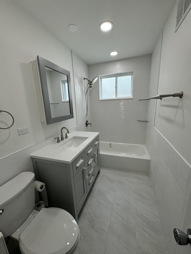 8117 S Keating Ave, Chicago, IL 60652 - bathroom with vanity, toilet, shower / washtub combination, and wainscoting