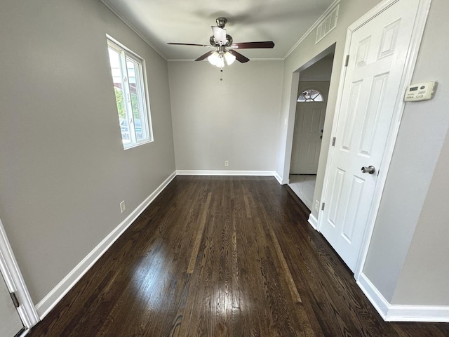 8117 S Keating Ave, Chicago, IL 60652 - empty room featuring dark wood-style flooring, ceiling fan, crown molding, and baseboards