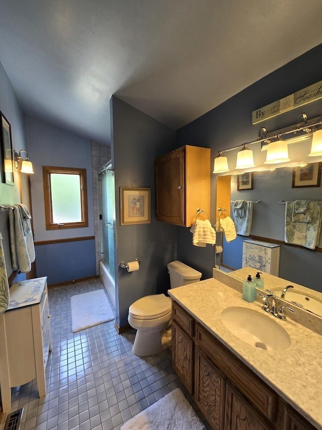 4910 143rd Pl, Midlothian, IL 60445 - full bath featuring vanity, toilet, lofted ceiling, tile patterned floors, and tub / shower combination