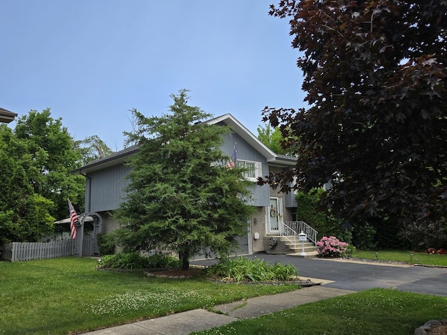 4910 143rd Pl, Midlothian, IL 60445 - view of side of property with brick siding and asphalt driveway