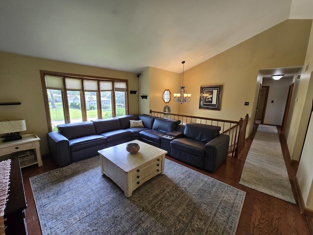 4910 143rd Pl, Midlothian, IL 60445 - living room featuring lofted ceiling, a chandelier, dark wood-style flooring, and baseboards