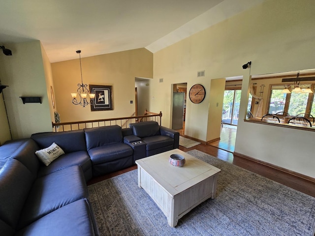 4910 143rd Pl, Midlothian, IL 60445 - living area featuring a chandelier, wood finished floors, high vaulted ceiling, and baseboards