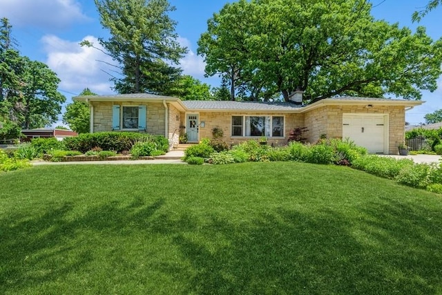 7807 Pershing Blvd, Kenosha, WI 53142 - ranch-style house with stone siding, a garage, a front yard, and driveway