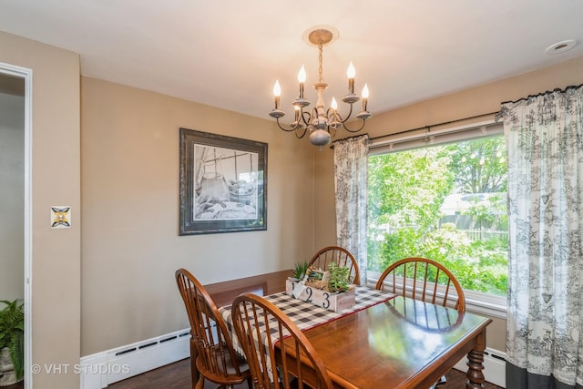 7807 Pershing Blvd, Kenosha, WI 53142 - dining room with a chandelier, a baseboard heating unit, and wood finished floors