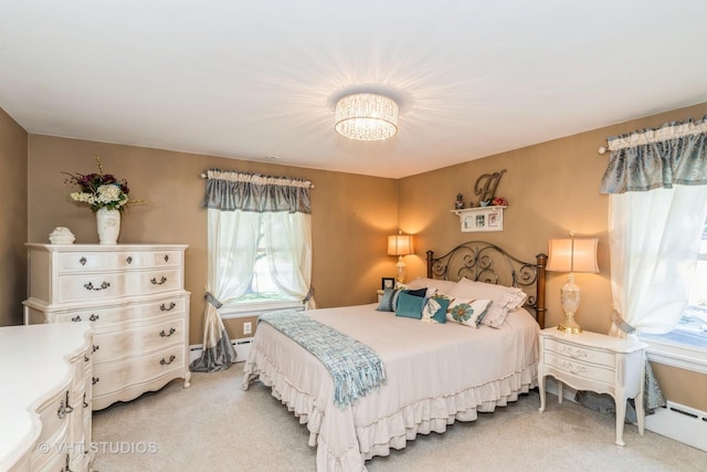 7807 Pershing Blvd, Kenosha, WI 53142 - bedroom with light colored carpet, a chandelier, and baseboard heating