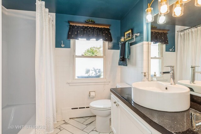7807 Pershing Blvd, Kenosha, WI 53142 - bathroom featuring baseboard heating, tile walls, vanity, wainscoting, and shower / bath combination with curtain