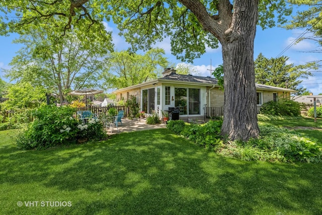 7807 Pershing Blvd, Kenosha, WI 53142 - back of property with a patio area and a chimney