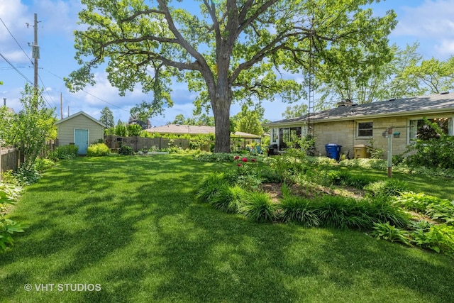 7807 Pershing Blvd, Kenosha, WI 53142 - view of yard with a storage unit