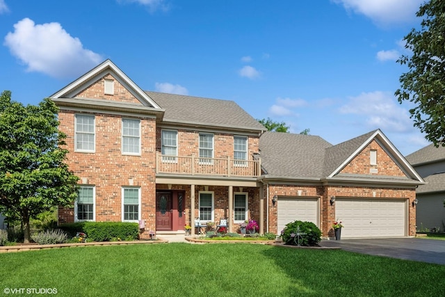 13008 Rockfish Ln, Plainfield, IL 60585 - view of front facade with asphalt driveway, a front lawn, a garage, brick siding, and a shingled roof