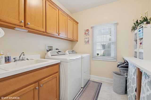 13008 Rockfish Ln, Plainfield, IL 60585 - laundry area with cabinet space, separate washer and dryer, and light tile patterned flooring