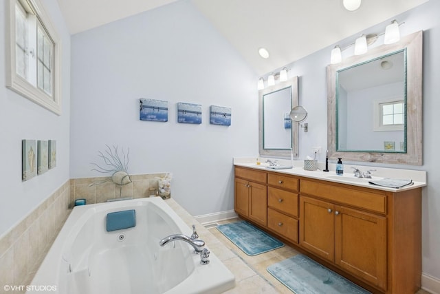 13008 Rockfish Ln, Plainfield, IL 60585 - bathroom with double vanity, lofted ceiling, and a jetted tub