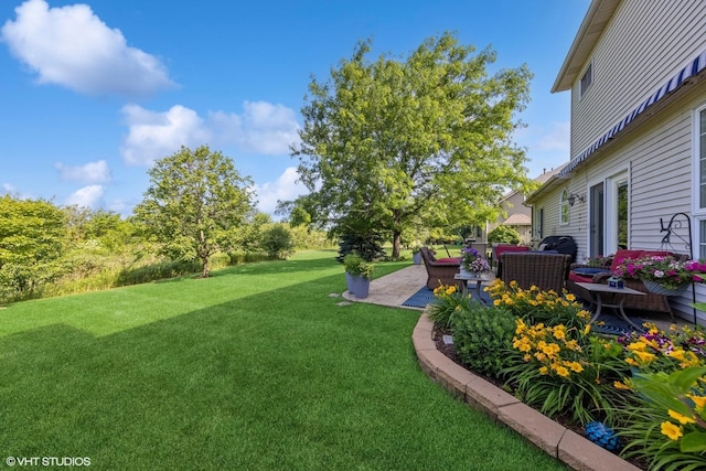 13008 Rockfish Ln, Plainfield, IL 60585 - view of grassy yard with an outdoor hangout area and a patio area