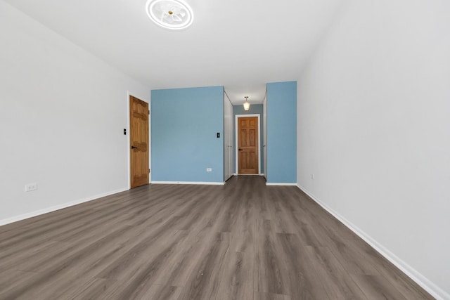 7200 N Ridge Blvd Unit 2K, Chicago, IL 60645 - unfurnished room with wood finished floors and baseboards