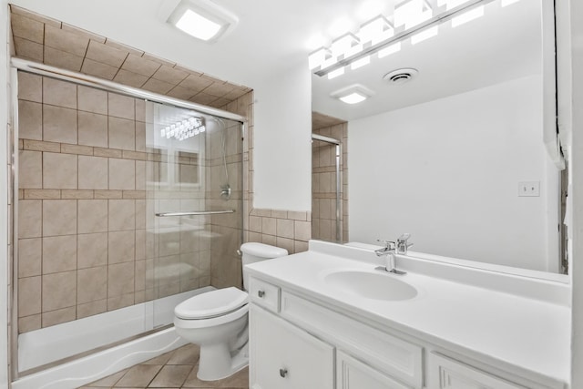 7200 N Ridge Blvd Unit 2K, Chicago, IL 60645 - bathroom featuring vanity, tile patterned floors, a stall shower, and tile walls