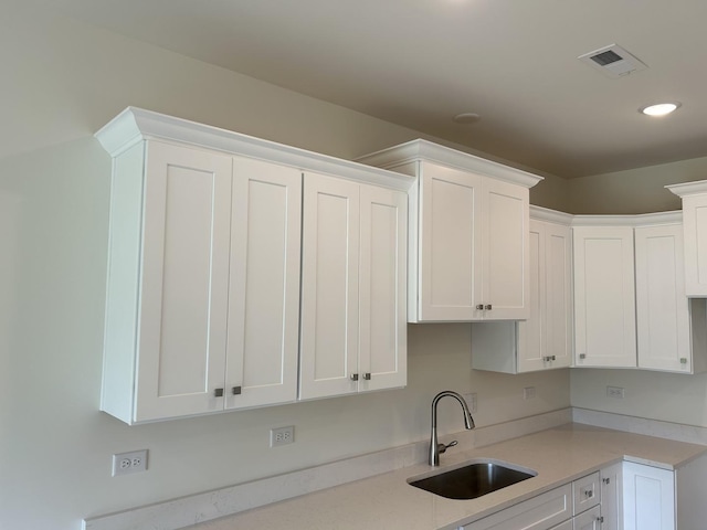 5400 135th St Unit 5406, Crestwood, IL 60418 - kitchen featuring white cabinets, light countertops, and recessed lighting