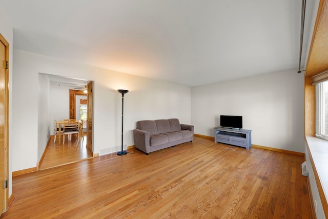 436 Marion St, Bensenville, IL 60106 - living room with light wood-type flooring and baseboards