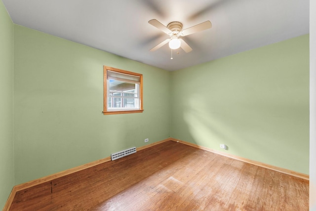 436 Marion St, Bensenville, IL 60106 - empty room with wood finished floors and a ceiling fan