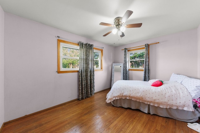 436 Marion St, Bensenville, IL 60106 - bedroom featuring wood finished floors and a ceiling fan
