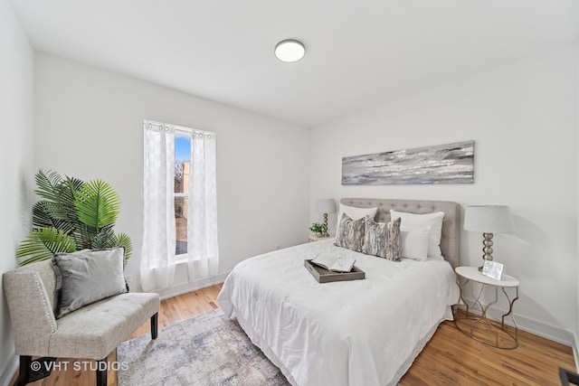 4752 S Champlain Ave, Chicago, IL 60615 - bedroom featuring wood finished floors and baseboards