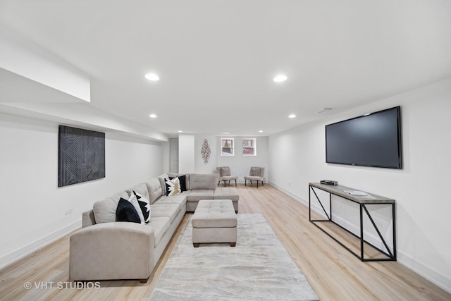 4752 S Champlain Ave, Chicago, IL 60615 - living room with light wood finished floors, baseboards, and recessed lighting