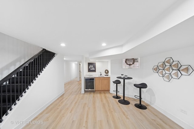 4752 S Champlain Ave, Chicago, IL 60615 - indoor wet bar with beverage cooler, light wood-type flooring, stairway, baseboards, and recessed lighting