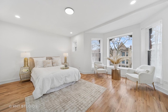 4752 S Champlain Ave, Chicago, IL 60615 - bedroom featuring baseboards, light wood-style floors, and recessed lighting