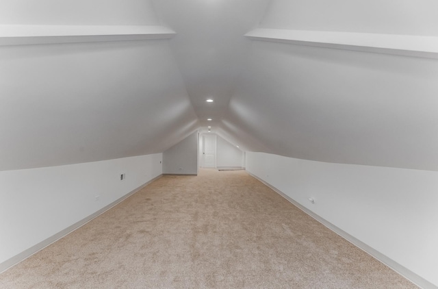 7955 S May St, Chicago, IL 60620 - additional living space featuring vaulted ceiling, light colored carpet, baseboards, and recessed lighting