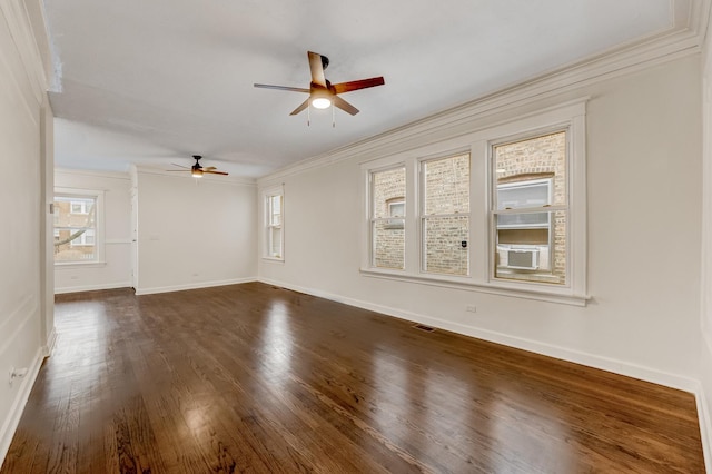 7955 S May St, Chicago, IL 60620 - unfurnished room featuring ceiling fan, crown molding, healthy amount of natural light, dark wood-style floors, and baseboards